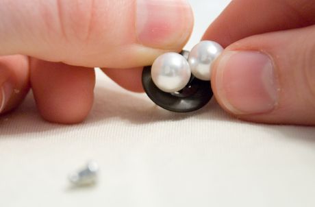 Secure earrings with a button